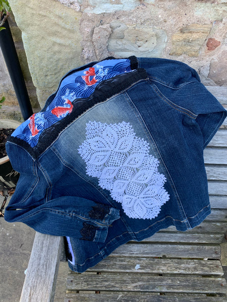Denim jacket with fish embellishments