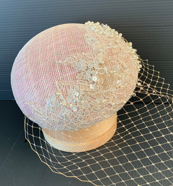 Jeannie - Blush pink small button fascinator with ivory pearl embellished lace and tiny cafe au lait colour veil