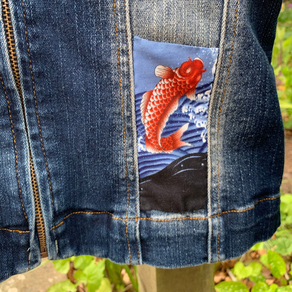 Denim jacket with fish embellishments